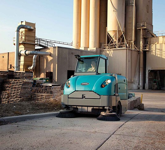 Tennant S30 sweeping cement yard
